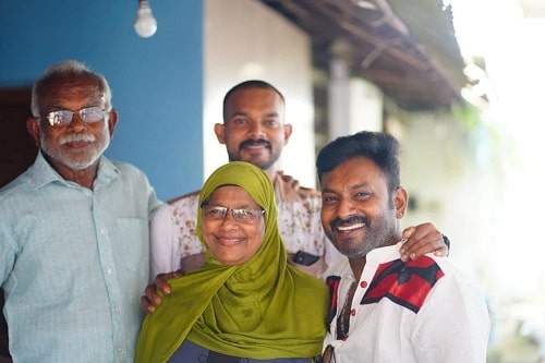 Firoz Azeez with his parents and brother