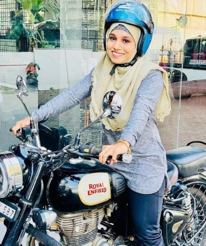 Majiziya Bhanu posing on her motorcycle