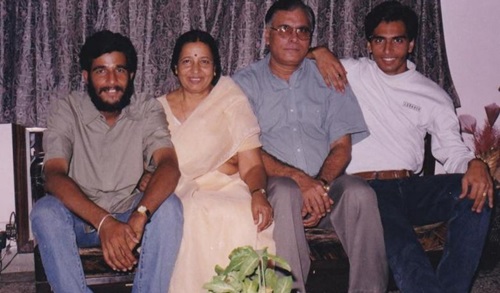 Major Mohit Sharma (left) with his parents and elder brother Madhur Sharma (right)
