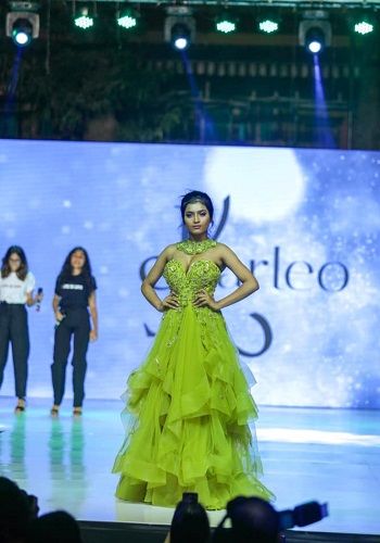 Manya Singh walking the ramp in a fashion show