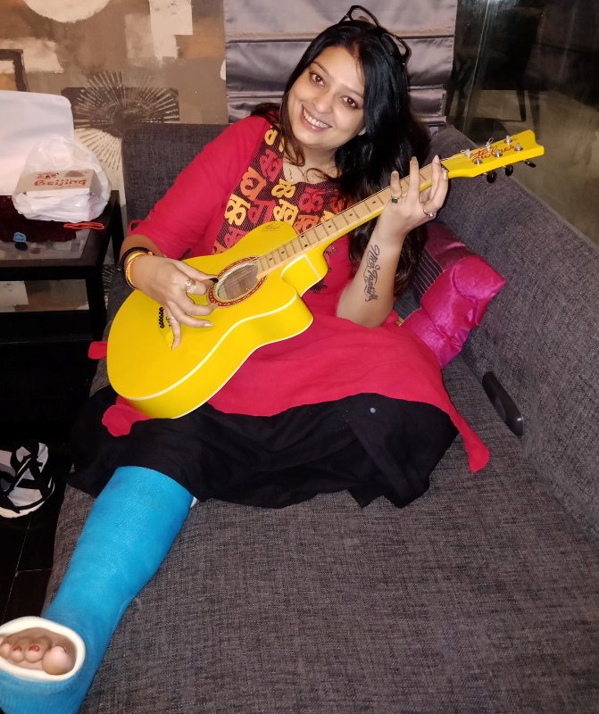 Priyanka Tibrewal posing with the guitar