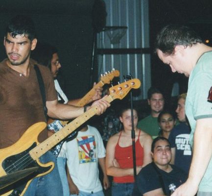 Raúl Castillo playing with his band members at a band reunion party