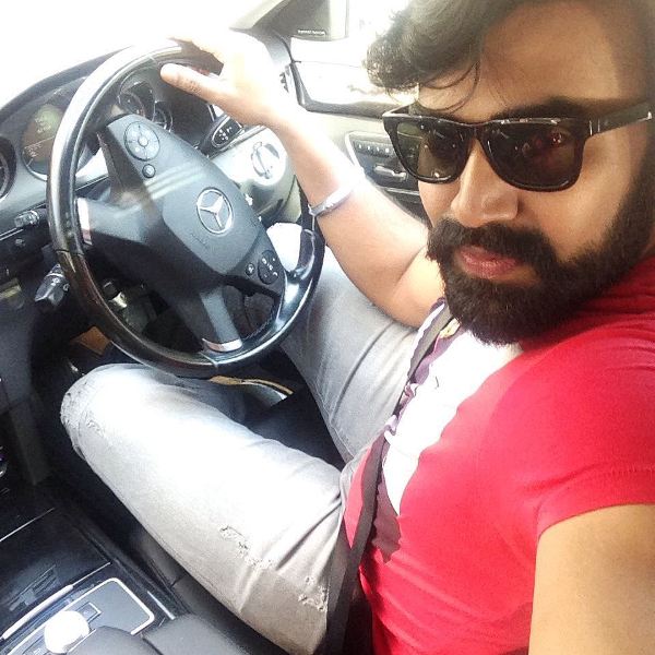 Sandeep Nahar inside his Mercedes Benz car
