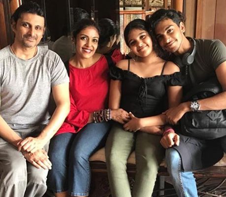 Sandhya Manoj with her husband and children