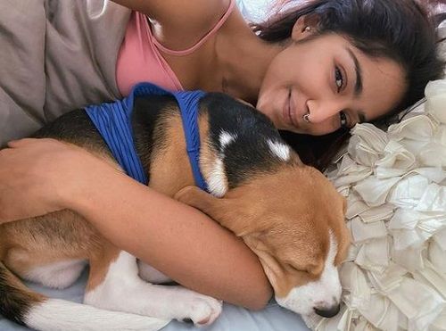 Santoshi Shetty with her pet dog
