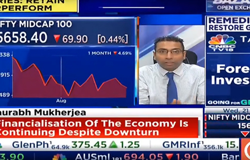 Saurabh Mukherjea discussing stocks on a news channel