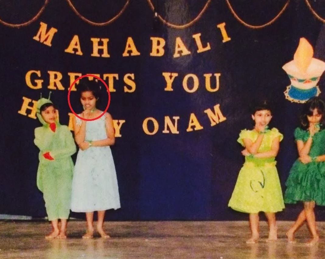 A picture of Preteen Michelle performing a dance act at a function held in her school on the occasion of Onam