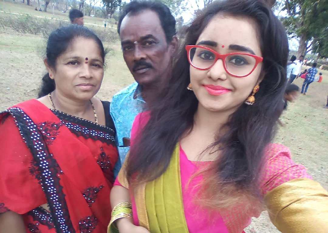 Dhanushree with her parents