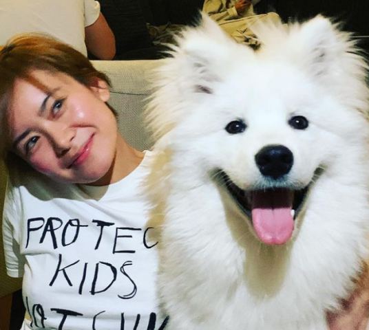 Katie Leung with her pet dog