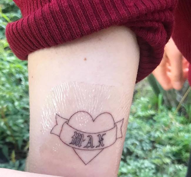 Phoebe Bridgers' sailor jerry heart tattoo