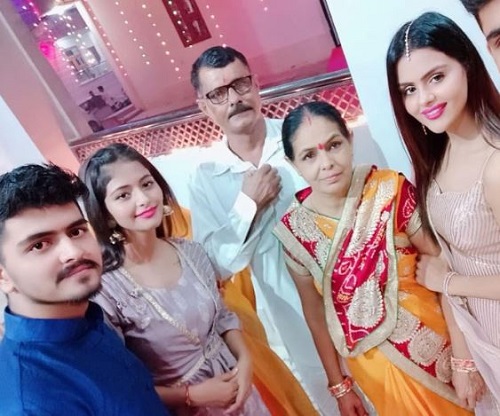 Priyanka Choudhary with her parents and siblings