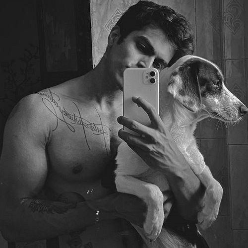 Trevon Dias with his pet dog