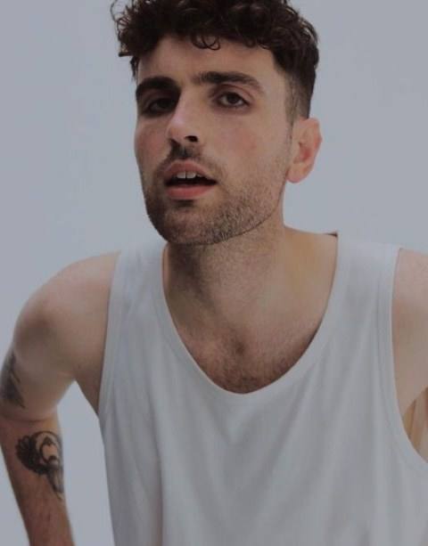 Duncan Laurence showing off his tattoos