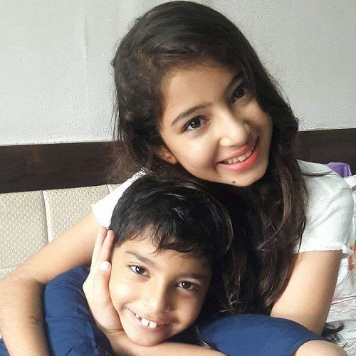 Sara Arjun with her brother