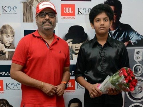Vivek with his son