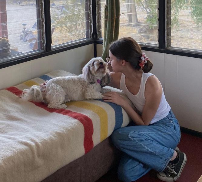Ciara Bravo with her dog