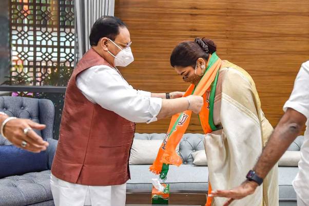 BJP National President JP Nadda greeting Khushbu Sundar as she joined the BJP at the party's headquarters in New Delhi