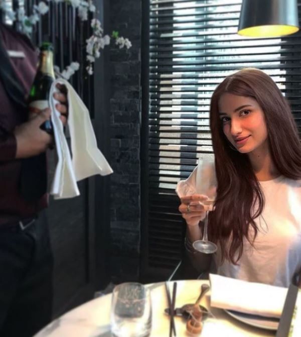 Diksha Singh enjoying a glass a wine