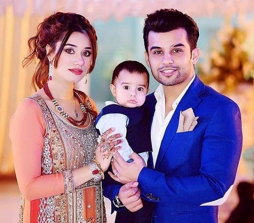 Fahad Shaikh with his wife and son