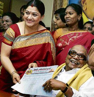 Kushboo Sundar with the former DMK President M Karunanidhi after joining the DMK in Chennai on 14 May 2010
