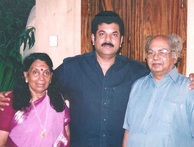 Mukesh Madhavan with his parents