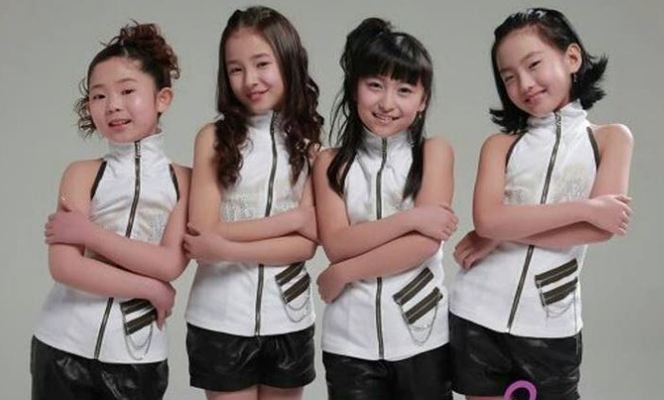 Nancy (second from left) as a part of Cutie Pies