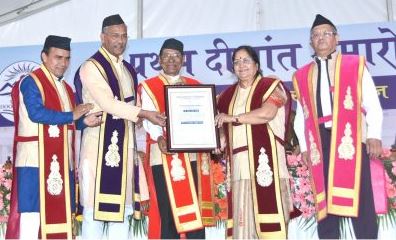 Negi while receiving the degree of Doctor of Literature in 2018