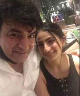 Raja Chaudhary with his daughter
