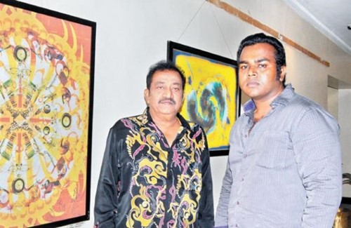 Pandu with his son P Panju during their art exhibition