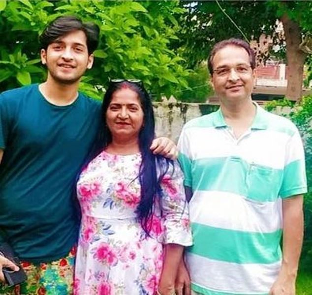 Rajat Verma with his parents