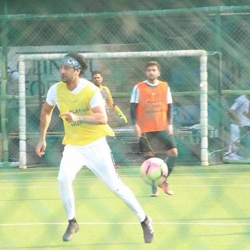 Ronnie C. playing football with Ranbir Kapoor