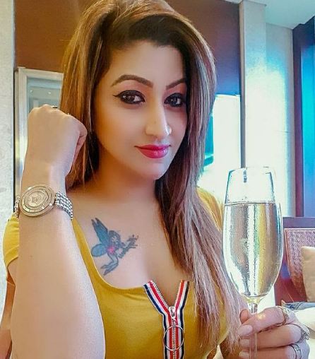 Roshni Kapoor with a glass of wine