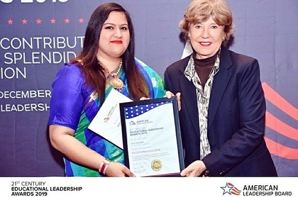Savi Kumar with her 21st-century Educational Leadership Award