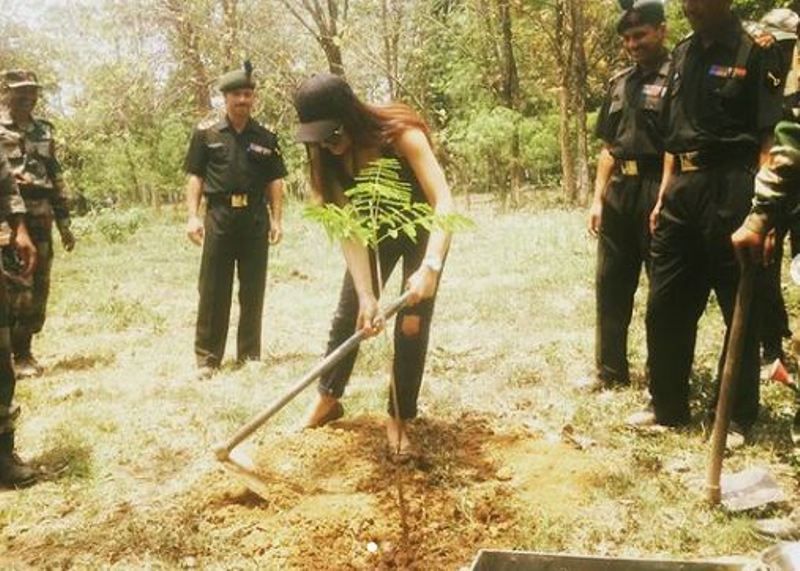 Shipra participating in a tree plantation campaign