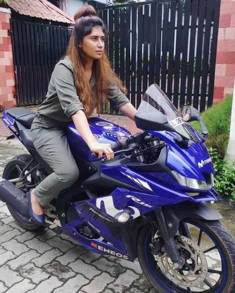 Aisha Sultana riding a bike