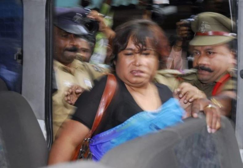 Bangladeshi writer Taslima Nasrin when escorted out of the press club by the Indian Police after she was manhandled by angry Muslim protesters in Hyderabad, India, Thursday, 9 August 2007