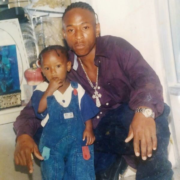 Childhood picture of Micheal Ward with his father