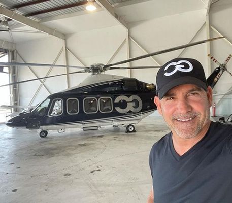 Grant Cardone with his AgustaWestland AW139