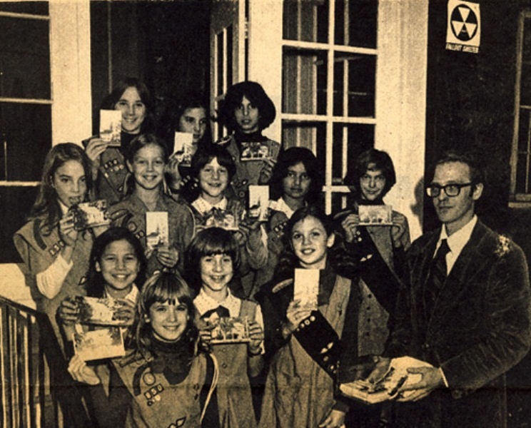 In a 1977 photo, Girl Scout Troop 850 promotes sales of postcards for the local historic jail. Lahiri is in the second row from the top, second from right