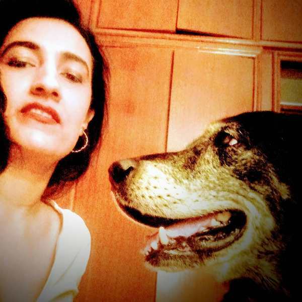 Karuna with her dog, Tigger