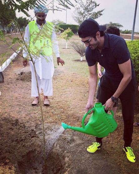 Shahzad Sheikh planting a tree during a plantation drive