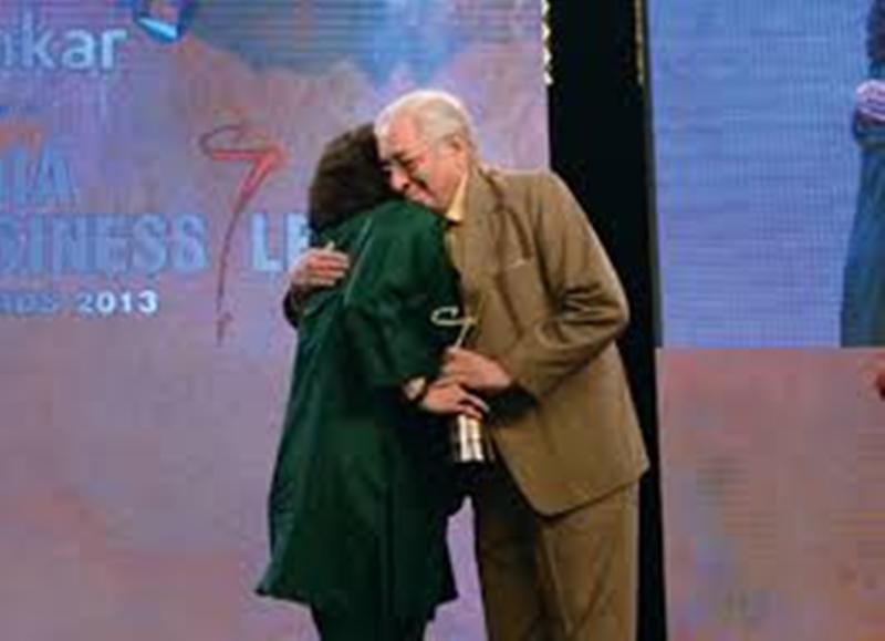 Zia Mody while receiving an award from her father, Soli Sorabjee, in 2013