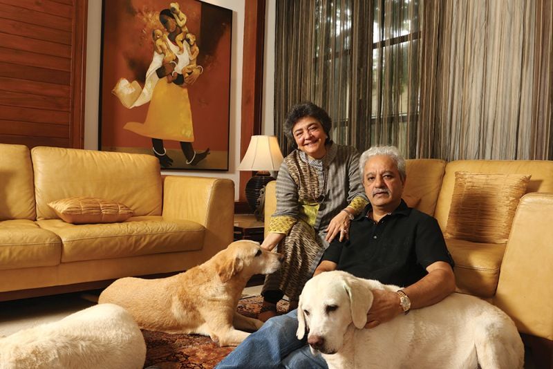 Zia with her pet dogs and husband, Jaydev Mody