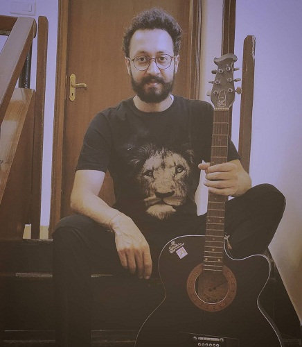 Abhishek Verma with his guitar
