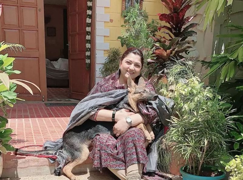 Khushbu Sundar with one of her pet dogs