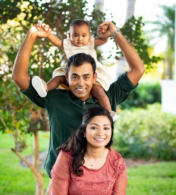 Anirban Lahiri with his wife and daughter