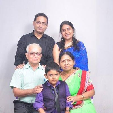 Dr Vikas Divyakirti with his parents, wife, and son