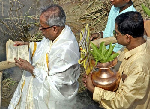 Pranab Mukherjee conducting Durga Puja with Abhijit Mukherjee at their ancestral village