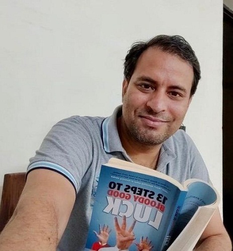 Sanjeev Rajput while reading a book