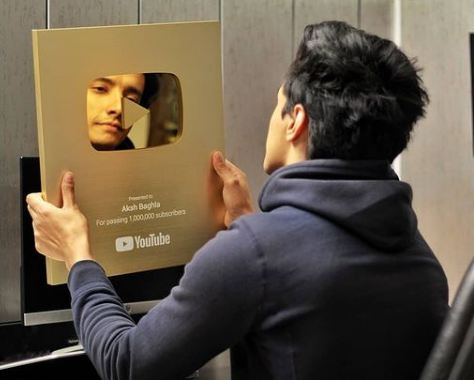 Aksh Baghla with his YouTube Gold Play Button